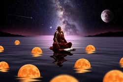 Buddhist monk sitting in the water with spheres of light