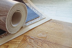 Waterproofness of linoleum. Protection of floor coverings from moisture. Waterproof linoleum in the kitchen. Sample roll.