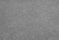 Light grey asphalt road texture, top view.