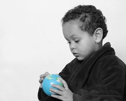 child with blue globe on earthday stock photo 