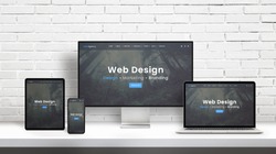 Web design agency concept presentation on displays of different dimensions. Modern flat web design template, theme concept. White brick wall in background