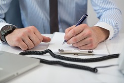 Young Businessman Writing A Letter Close Up - Notes Or Correspondence Or Signing A Document Or Agreement