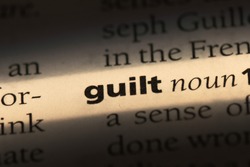 guilt word in a dictionary. guilt concept
