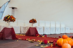 Wedding path and decorations for newlyweds. Autumn wedding concept.