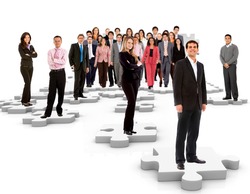 Group of business people standing on the pieces of a puzzle - isolated over a white background