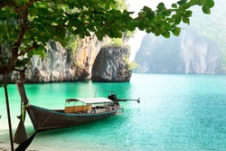 long boat on island in Thailand