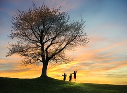 Children playing in sunset, silhouette, freedom and happiness