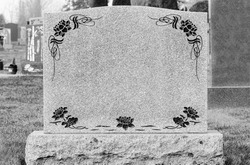 Large blank tombstone in the cemetery 