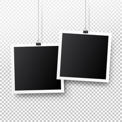 Blank photo frame set hanging on a clip. Retro vintage style. Black empty place for your text or photo. Realistic detailed photo icon design template. Vector solated on transparent background.