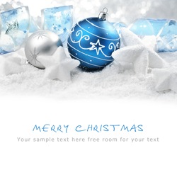 Christmas ornaments on snow,Copy space for your text.