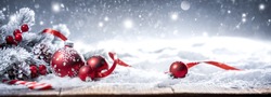  Christmas Holiday Background with Red Bauble on Snow