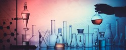 Scientist holding flask lab glassware in laboratory, science laboratory research and development