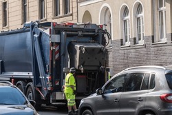 Garbage collection in a big city hinders traffic