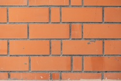 Appearance Of A Wall Made Of Well Masonry With Filling Voids With Mortar. Side View. Red Bricks Wall. Conceptual Background.