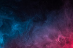 Colorful smoke close-up on a black background