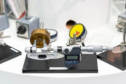 Close up accuracy and precision digital micrometer equipment for measuring dimension or inspection workpiece on table