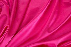 Pink silk background. Close up. Whole background.