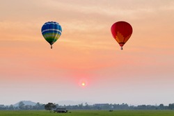 color hot air balloon in beautiful sky at sunset background 
