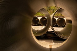 FRP (GRP) pipes are waiting in the field for installation
