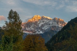 Snowy Marmolada Glacier and Lago Fedaia (Fedaia Lake), Fassa Valley, Trentino Alto Adige, an artificial lake and a dam near Canazei city, located at the foot of Marmolada massif, Dolomiti Range, Italy