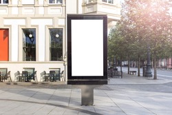 Mockup template of street lightbox stand signboard in the european city center.