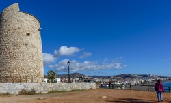 View of historic El Cantal watch tower on the Mediterranean coast of Rincon de la Victoria, Malaga, Spain.