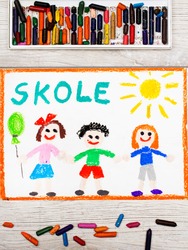 Photo of  colorful drawing: Swedish word SCHOOL and happy children. First day at school. 