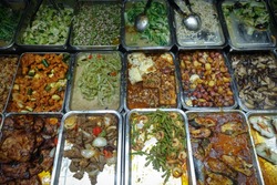 Meat and Vegetable Filipino Foods in Trays at Market Eatery in Philippines