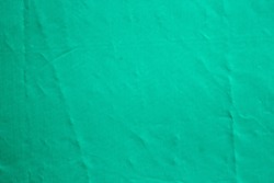old green tarpaulin detail background                               