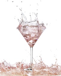  Martini glass isolated splashing on a wet surface