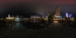 full seamless spherical night 360 panorama on wooden bridge across river among modern glowing skyscrapers and office buildings in equirectangular projection, for VR AR content