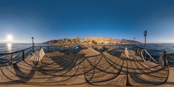 full seamless spherical hdr 360 panorama view on coast of sea with wooden pier and sun loungers by red sea in bright sunny day in equirectangular projection, ready for VR AR virtual reality