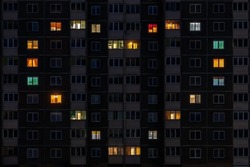 flat night panorama of multicolor heart light in windows of multistory buildings as concept for a couple in love