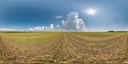 full seamless 360 hdri panorama view among farming fields with sun with huge clouds in clear sky in equirectangular spherical projection, ready for VR AR virtual reality content
