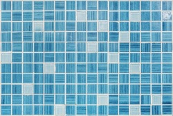 texture of small blue ceramic tiles in a chaotic manner background for elite interior of bathroom, wc, lavatory and restroom
