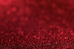 Red glitter. Shiny red abstract christmas background.