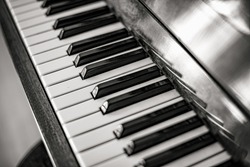 Old piano and keys close up. Toned photo