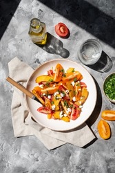 Balsamic tomato and peach salad with feta. Quick and easy summer salad