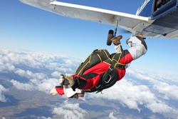 Skydiver jumps from an airplane
