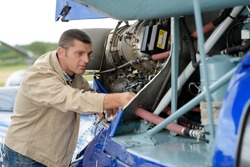 portrait of the mechanics of the helicopter