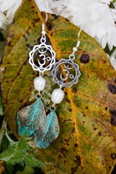 Earrings with burdock leaves and river white pearls