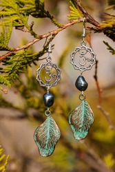 Earrings with burdock leaves and river black pearls