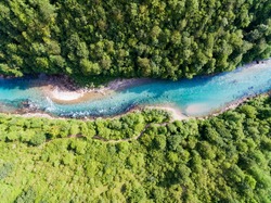 Amazing aerial shot of beautiful blue Tara river. Forest background.