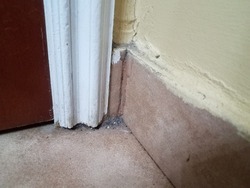 dirty filthy corner in bathroom with dust and grime
