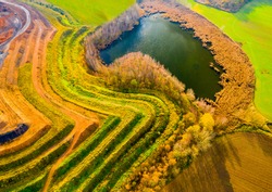 Aerial view of recultivated  landscape after mining. Dump from old underground mine. Climate change concept. Back to nature. Western Bohemia, Czech Republic, European Union.