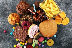 Unhealthy products. food bad for figure, skin, heart and teeth. Assortment of fast carbohydrates food. 