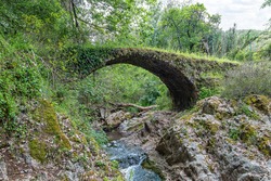 The Medieval Bridge of La Nava in the mountains of Huelva. Located on a bend in the Murtigas River, this bridge is well preserved and although many call it roman bridge, it was built in 1484.