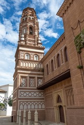 Tower of the church of Santa María de Utebo, Mudejar style, in Zaragoza, Poble Espanyol, Spanish Village in Barcelona, Catalonia, Spain.