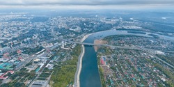 Ufa, Russia. Panorama of the city from the air during sunset. Cloudy weather. Aerial view