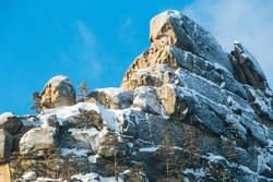 Stone rock in snow. In Kazakhstan Natonal park Burabay (Borovoe)